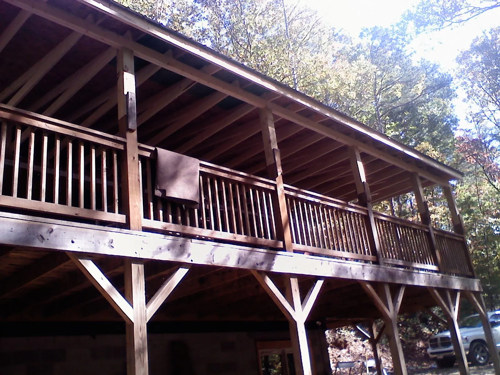 Timber framing under a new elevated porch and deck — Roof Leak Repair in Mapleton by Roofing Brothers